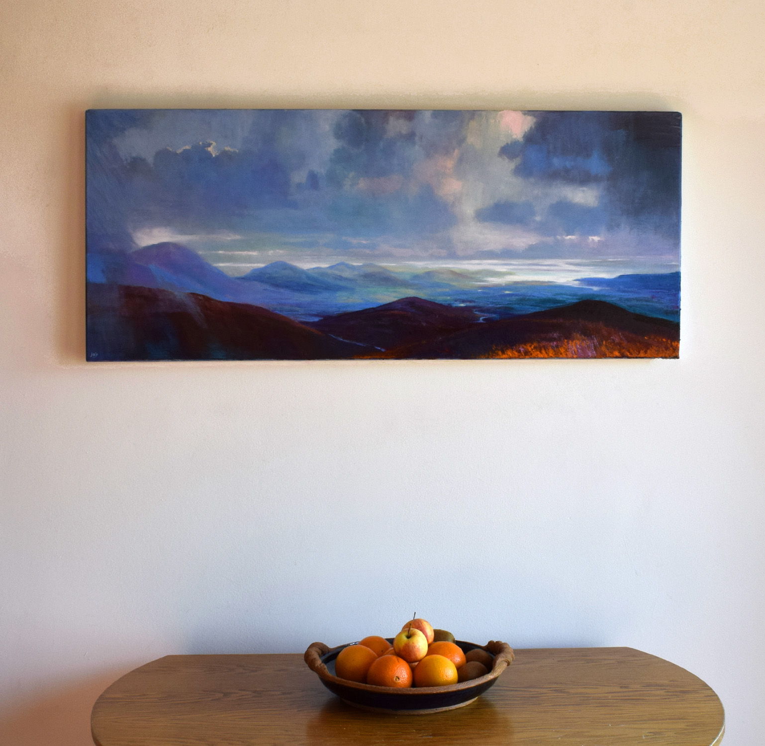 Panoramic west of Ireland oil on canvas painting called 'As Far as the Eye Can See VI' by John O'Grady displayed in living room